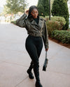OLIVE GREEN FAUX LEATHER CROPPED BIKER JACKET WITH AN OVERSIZED FIT - OVERSIZED WOMEN'S CROPPED FAUX LEATHER JACKET IN OLVE GREEN WITH WAIST BELT AND ZIPPER CLOSURE